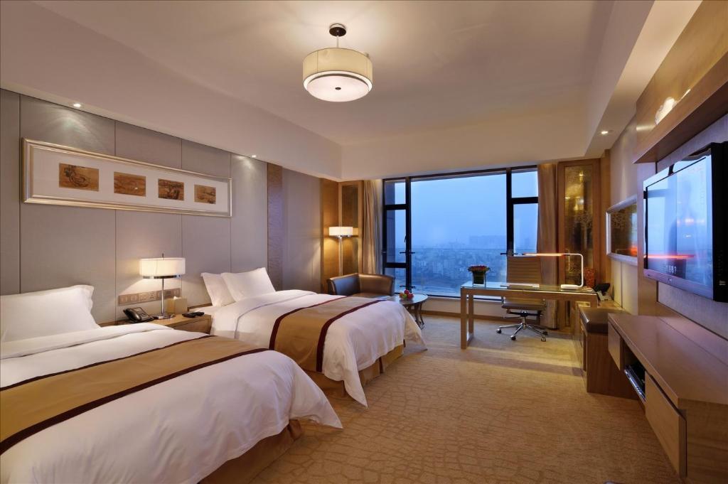 Sovereign Hotel Zhanjiang Zimmer foto